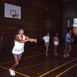 Playing basketball