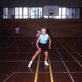 Ladies playing basketball
