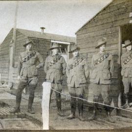 Five Australian soldiers outside a hut in the camp at Heytesbury, 1918