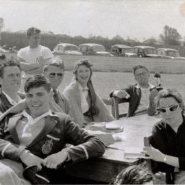Unidentified students and staff at an Athletics Carnival. A photograph from the Newcastle Teachers' College, NSW, Australia 1957 Album