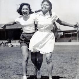C. Hatumesen and Z. Hamid at an Athletics Carnival. A photograph from the Newcastle Teachers' College, NSW, Australia 1957 Album
