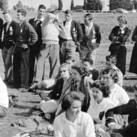 Spectators at a Rugby Union match. A photograph from the Newcastle Teachers' College, NSW, Australia 1957 Album