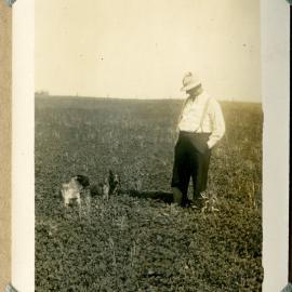 More clover, Vacy, NSW, unidentified man with two dogs, c. 1940s