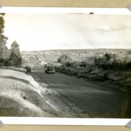 Car on Minmi Road, c. 1940s
