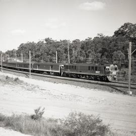 Locomotive 27 and 3 x 46 class Down Goods at Fassifern, NSW, February 1985