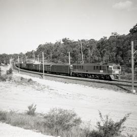 Locomotive 27 and 3 x 46 class Down Goods at Fassifern, NSW, February 1985