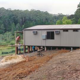 Constructing a demountable building at Central Coast Camps [1993].