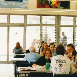 Unidentified students in the courtyard under the sails near Campus Central, Central Coast Campus [c.1995-2000].