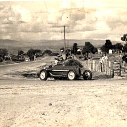 Racing car at Hell Corner, Mt Panorama, Bathurst, NSW, [late 1940s?]