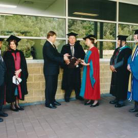 Les Eastcott and Gaye Hart at a Central Coast Campus Campus Graduation Ceremony [1997]