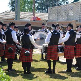 Pipe band at the memorial service at the Jim Comerford Miners Memorial Wall, Aberdare, NSW, 22 September 2013