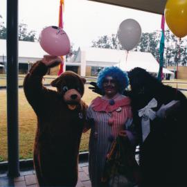 Unidentified performers at a Central Coast Campus open day in the main quadrangle opposite the Co-op Bookshop [n.d.]