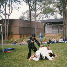 Unidentified performers giving a martial arts demonstration at a university open day at Callaghan Campus [n.d.] [Features the same people as the previous images 01536 and 01537]