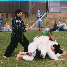 Unidentified performers giving a martial arts demonstration at a university open day at Callaghan Campus [n.d.] [Features the same people as the previous image 01536]