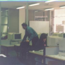 [unidentified people] in an unidentified computer lab at Central Coast Campus [n.d.] [unknown location]