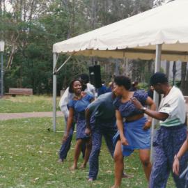 [unidentified people] performing at a university open day at Callaghan Campus [n.d.]