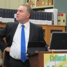 Geoff Hinchcliffe, Director, of State Records NSW, with Carrington Albums, University of Newcastle, 3 June 2015