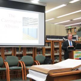 Geoff Hinchcliffe, Director, of State Records NSW, with Carrington Albums, University of Newcastle, 3 June 2015