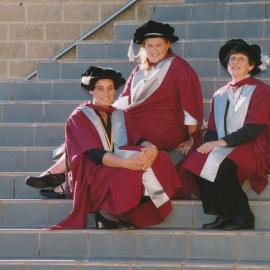 Three graduating PhD students