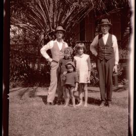 Two unidentified men with three children (Jim, Mary and Bill Rodoni) at residence "Carlcew' at Waratah, New South Wales (film negative), c1920s