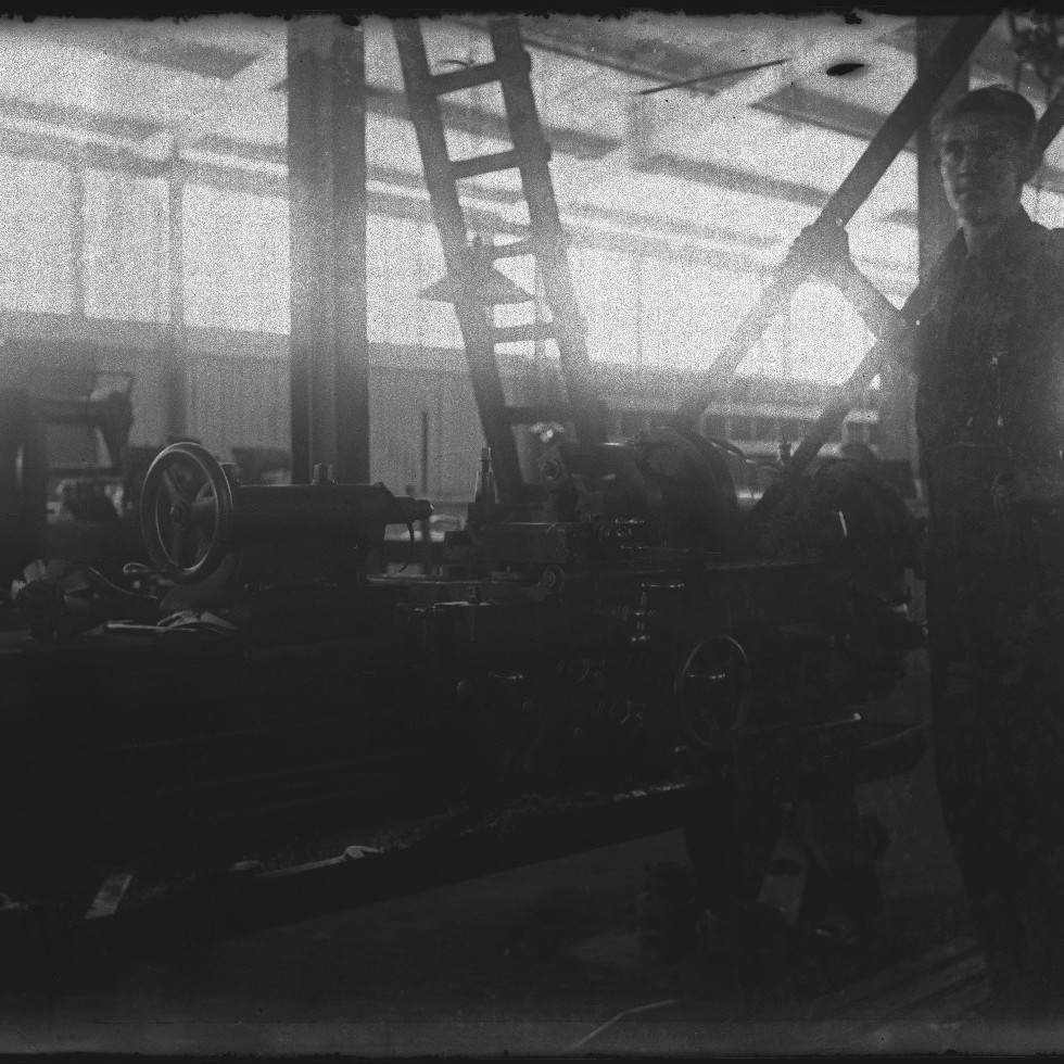 Interior of factory with employees, c1920s