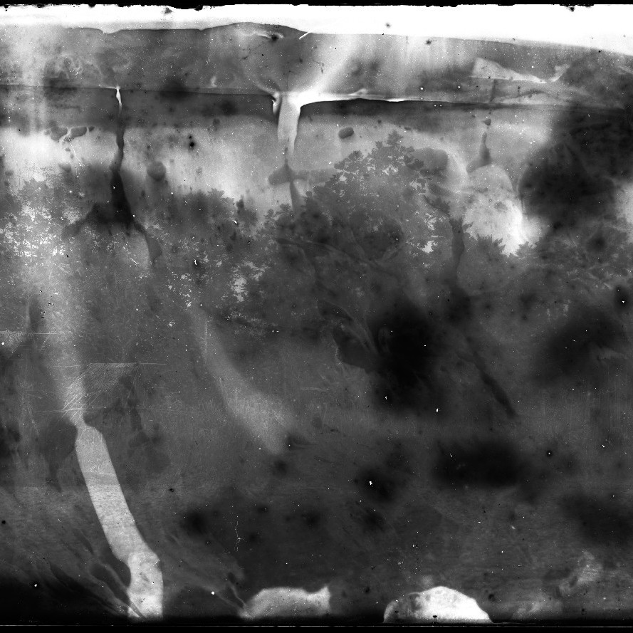 Deteriorated negative showing river, jungle, mountain scenes, New Guinea? c 1914-1915