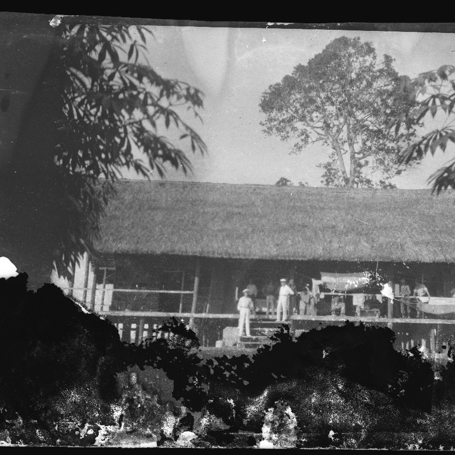 House with people on the verandah (film negative) August 1914 to January 1915 New Guinea