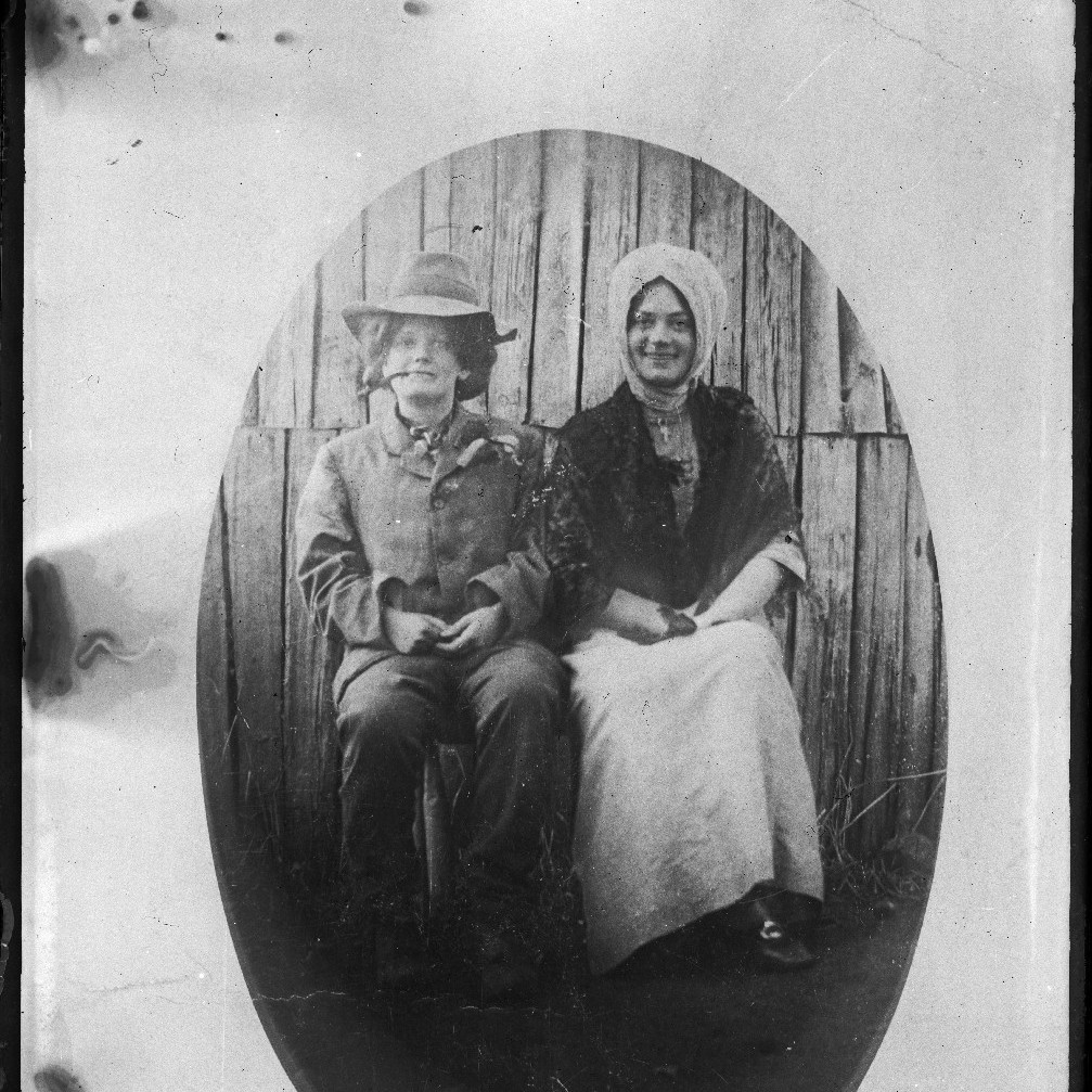 Photograph of a photograph, Girls playing dress up, Catherine Annie Rodoni (nee Wilson) c1915in white skirt