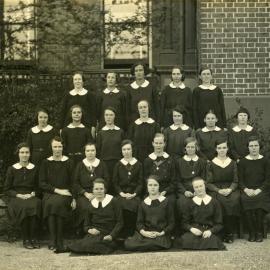 Undentified group, includes Kathleen Walsh (2nd row, seated 4th from right)