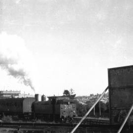 NSWGR C30 Class No. 3048 4-6-4 Suburban Tank locomotive on down passenger at Lidcombe, [1925]