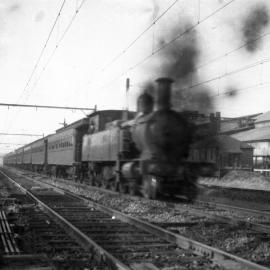 NSWGR C-30 Class 4-6-4 Type Suburban Tank Locomotive hauling northbound passenger through Rhodes - Lewis Berger & Sons to right, [1930s]