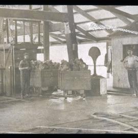 Coal miners on surface near cage, NSW