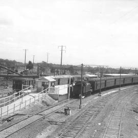 NSWGR C30 Class arriving Blacktown from Richmond with electric suburban set on adjacent platform, [1953]