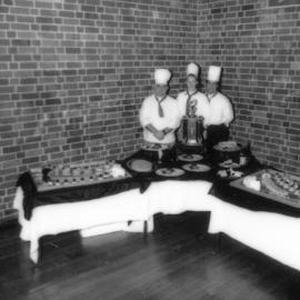 (L to R) Michael Baxter, Tracey Andrews, Robert MacKinnon (all trainee chefs) with their trophies, at the University of Newcastle, Australia