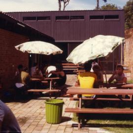 Shortland Union Building - students relaxing in the cafe courtyard, the University of Newcastle, Australia