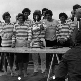 Monash University, which won the Oxford and Cambridge Cup for eights at the Intervarsity rowing at Taree, seen with the Mayor of Taree (Alderman Bill Kennedy) and the Chancellor (Sir Alister McMullin), NSW, Australia