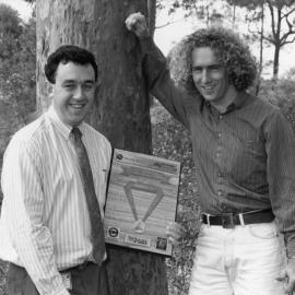 Kent Gillman and Daylan Cameron receive an award from Pacific Power for Environment Week ‘93, at the University of Newcastle, Australia