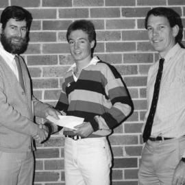 Associate Professor John Fryer the Head of Department presenting Mr Gerard Morton, the Frank Henderson Prize Scholarship and Professor Rob Melchers looks on, the University of Newcastle, Australia