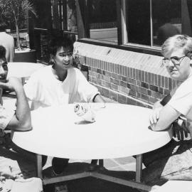 Students relaxing outside The Godfrey Tanner Bar, the University of Newcastle, Australia