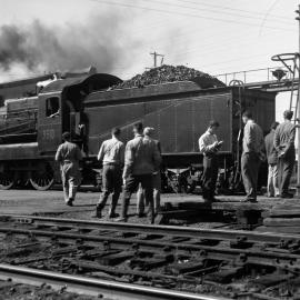 NSWGR C-35 Class No. 3510 4-6-0 Type Express Passenger Locomotive coupling to a tour train at Broadmeadow, [1960s]