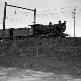 NSWGR C35 class locomotive, No. 3526, hauling the "Caves Express" near Lidcombe, 1933-36