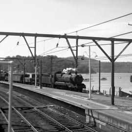 NSWGR C35 Class 4-6-0 Type express passenger locomotive hauling pick-up goods train at Hawkesbury River, [1960]