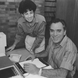Mr Ray Paul, pictured with Ms Anne Robinson, Reference Librarian, demonstrating the Kurzweil Personal Reader for the blind, the University of Newcastle, Australia - 1989