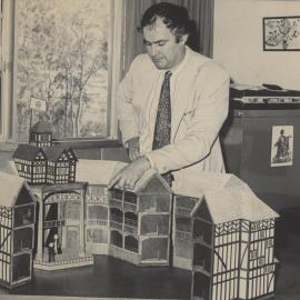 Professor David Frost from the English Department with a model of the Globe Theatre, the University of Newcastle, Australia