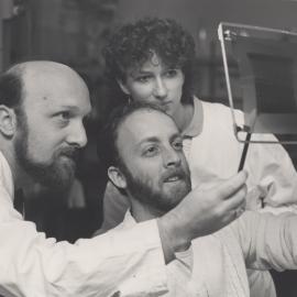 Three unidentified members of the Neurosciences Team, the University of Newcastle, Australia