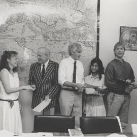 Professor Godfrey Tanner with Dr Bernie Curran (far right) at a student presentation, the University of Newcastle, Australia