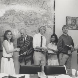 Professor Godfrey Tanner with Dr Bernie Curran (far right) at a student presentation, the University of Newcastle, Australia
