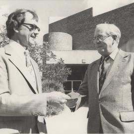Vice-Chancellor Professor Don George receiving a cheque from TUNRA Chairman, Alec Forsythe, at the University of Newcastle, Australia