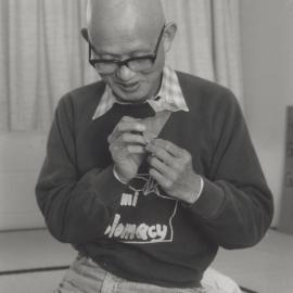 Mr Saburo Kase, blind Origami artist from Japan who visited the campus (seen here making a fox), the University of Newcastle, Australia
