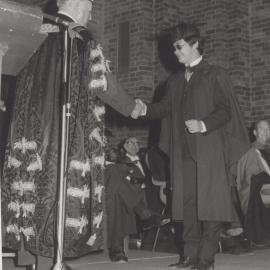 Sir Alister McMullin (Chancellor) congratulates a graduate, the University of Newcastle, Australia